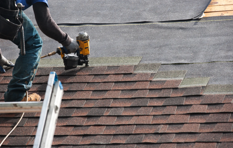 comparing roofing company quotes